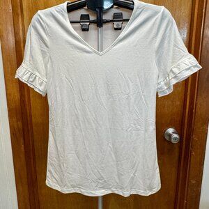 Women's Shirt, NWOT. White with ruffles on the sleeves.